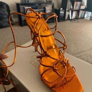 Burnt Orange lace up heels.